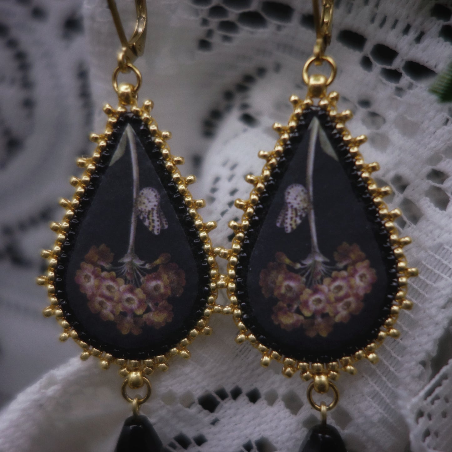 Boucles fleur et papillon