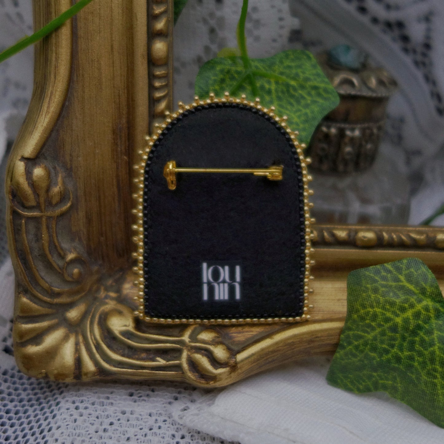 Broche Memento mori