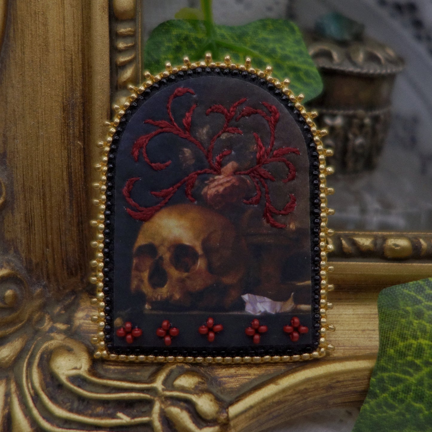 Broche Memento mori