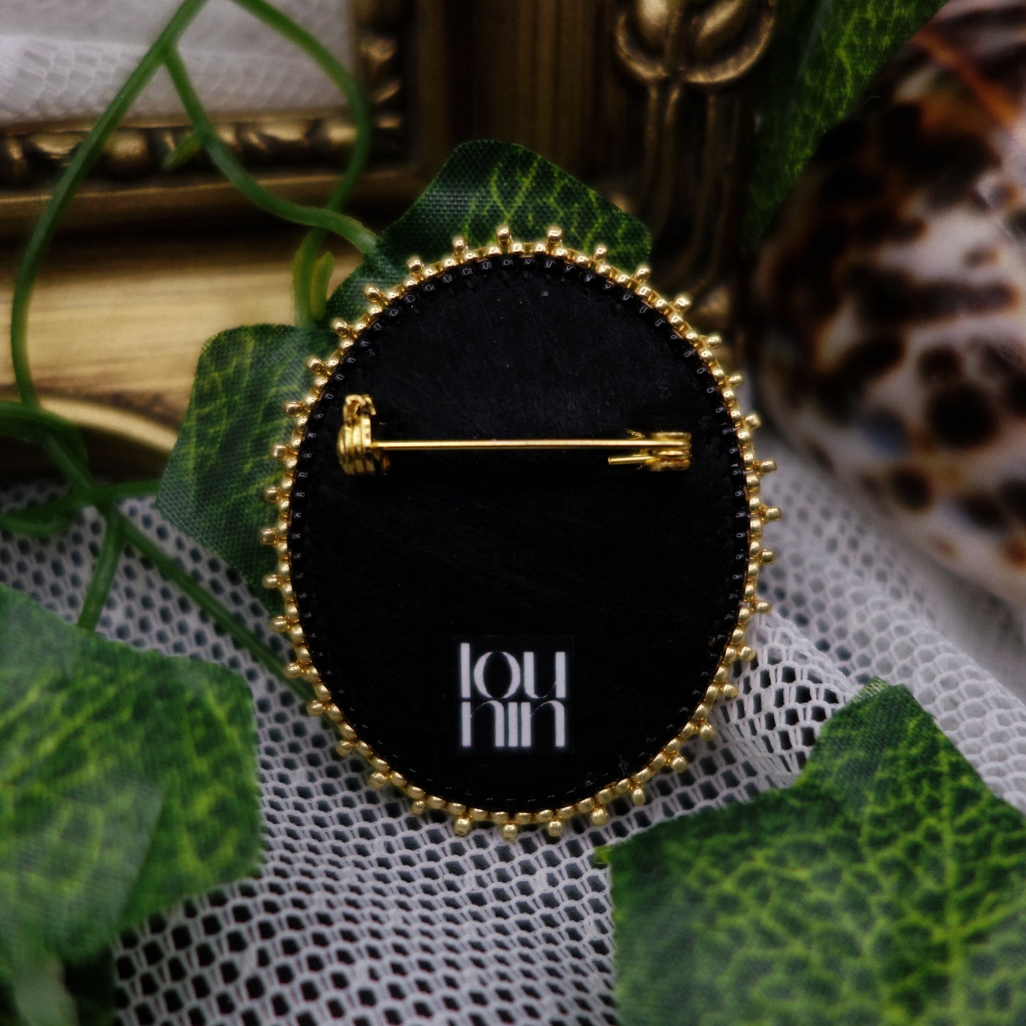 Broche portrait papillon