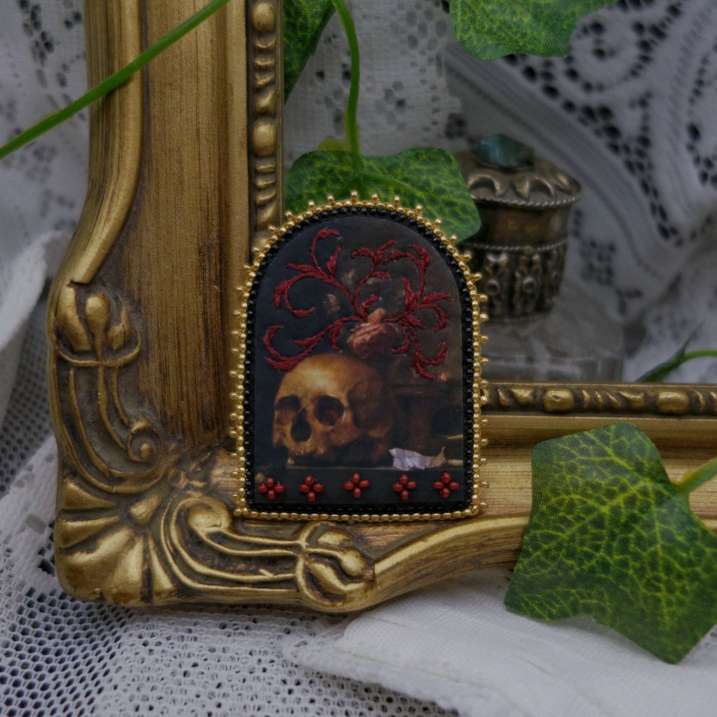 Broche Memento mori