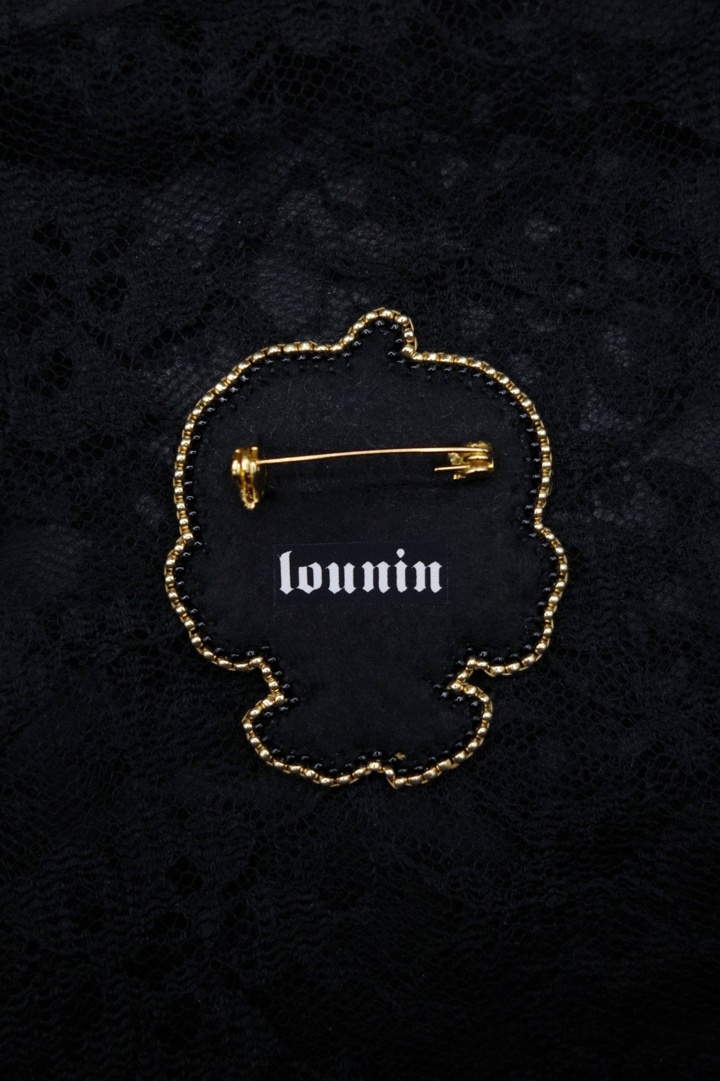 Broche tête de poupée citrouille