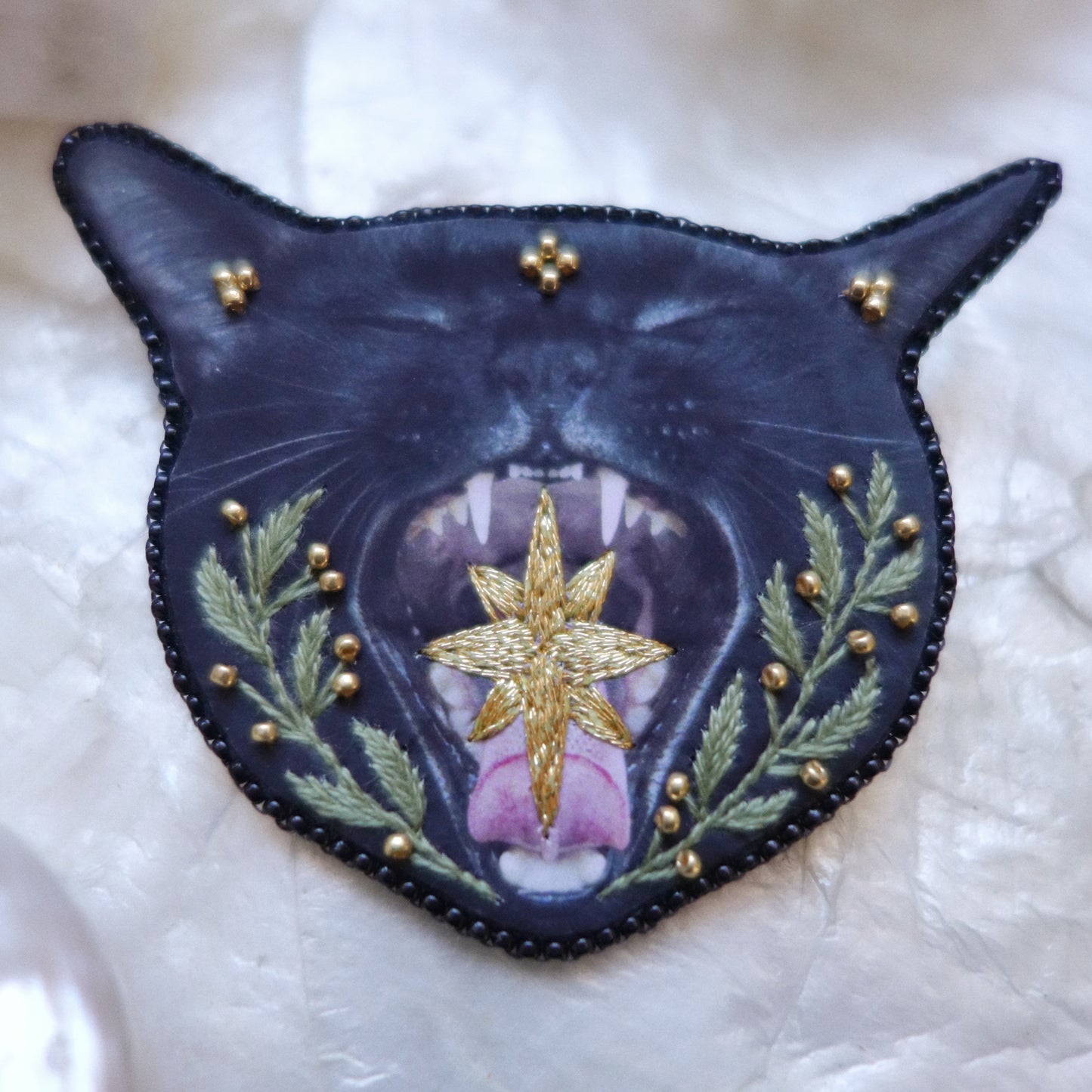 Broche chat