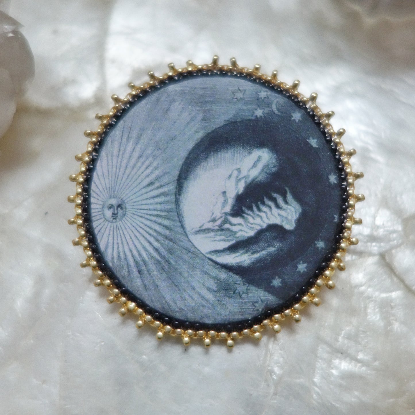 Broche astres