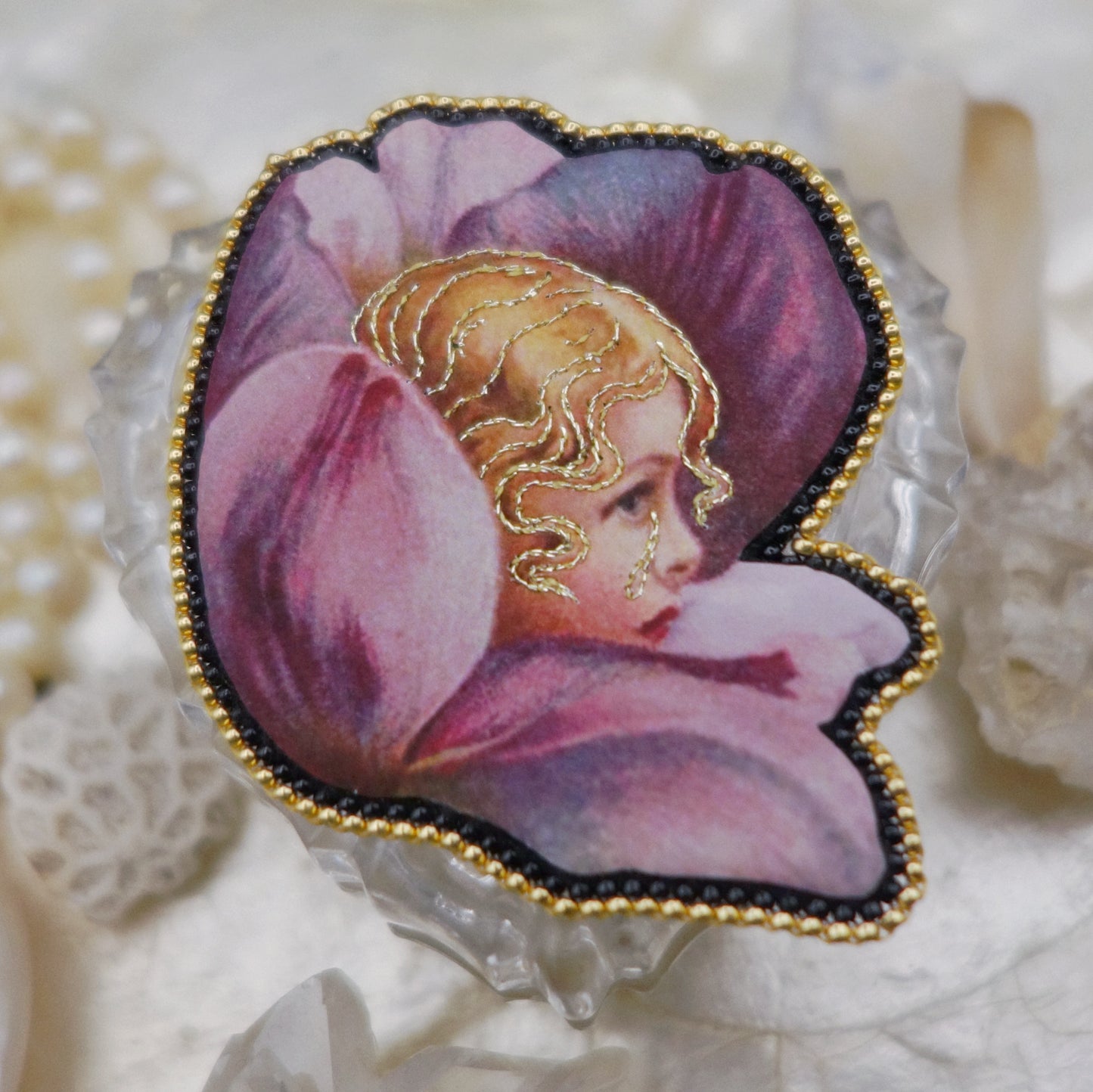 Broche fleur et tête