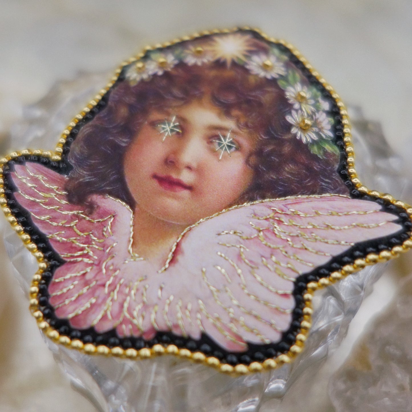 Broche tête d'ange