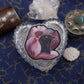 Broche fleur et corbeau