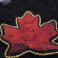 Broche feuille "eat the rich"