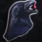 Broche corbeau