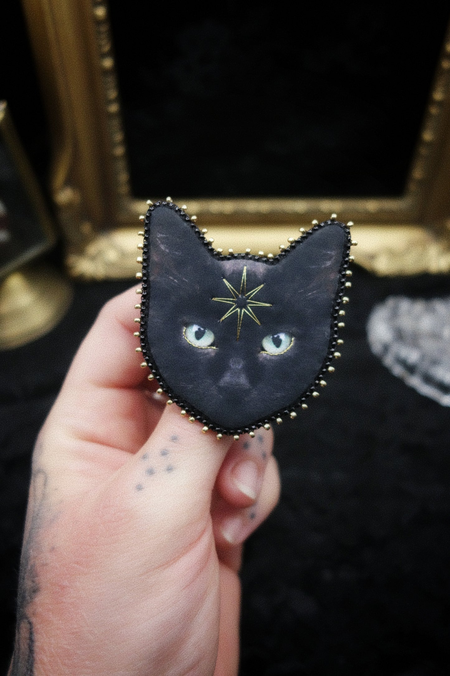 Broche chat