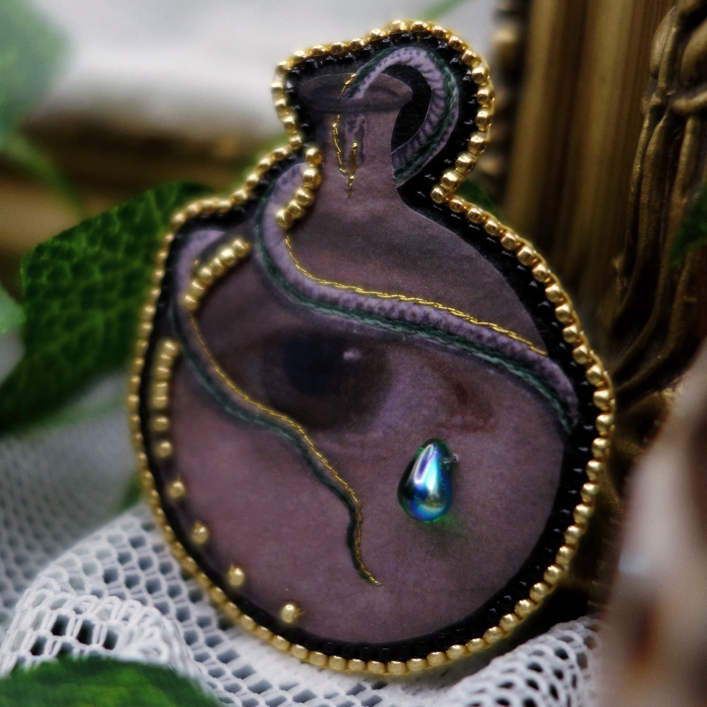 Broche fiole œil et serpent -- vide atelier
