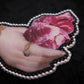 Broche main et cœur barbelé