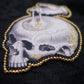 Broche memento mori