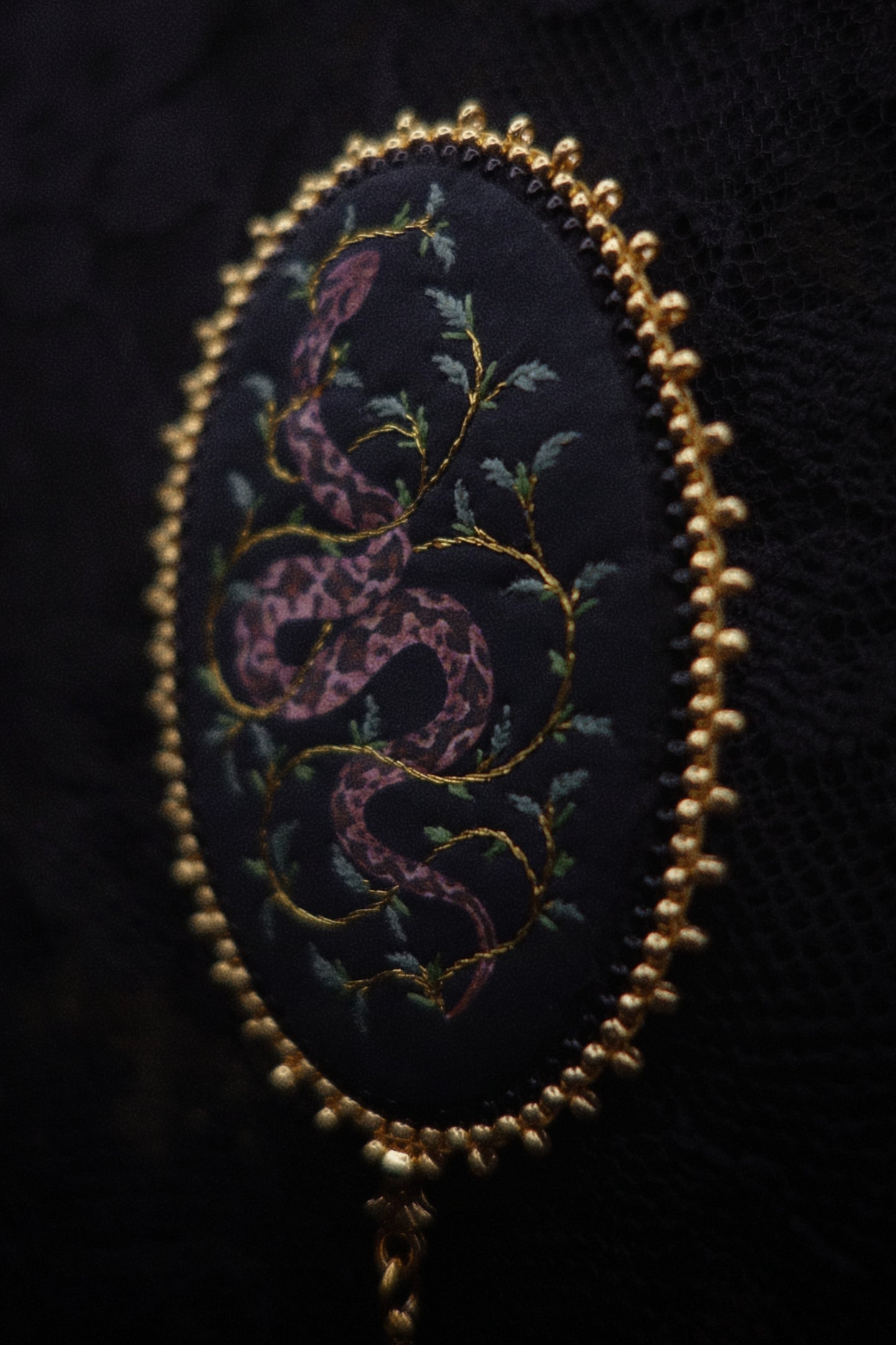 Broche serpent
