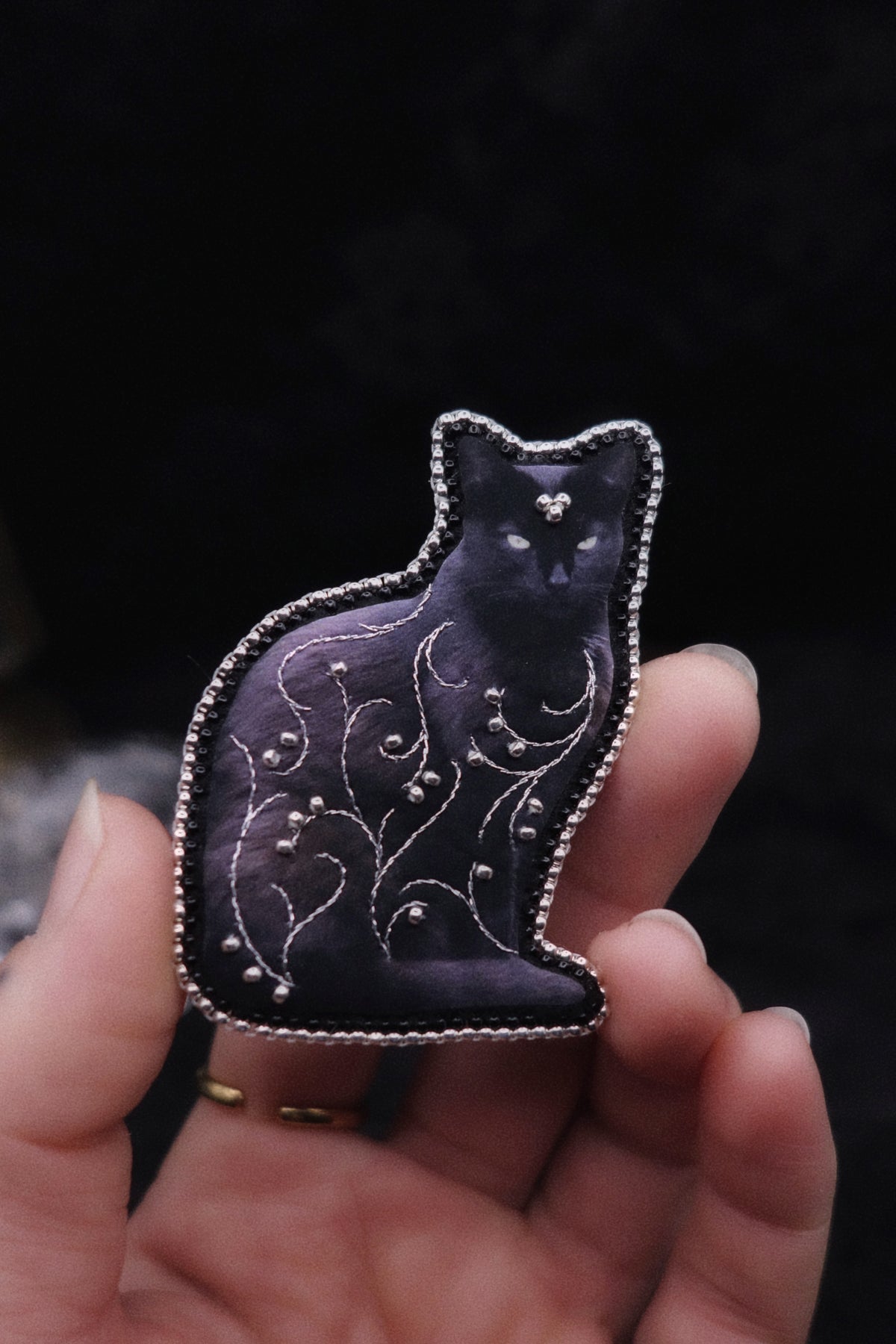 Broche chat noir