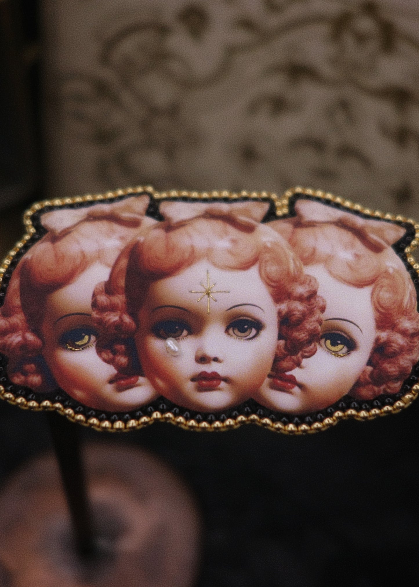 Broche triple tête