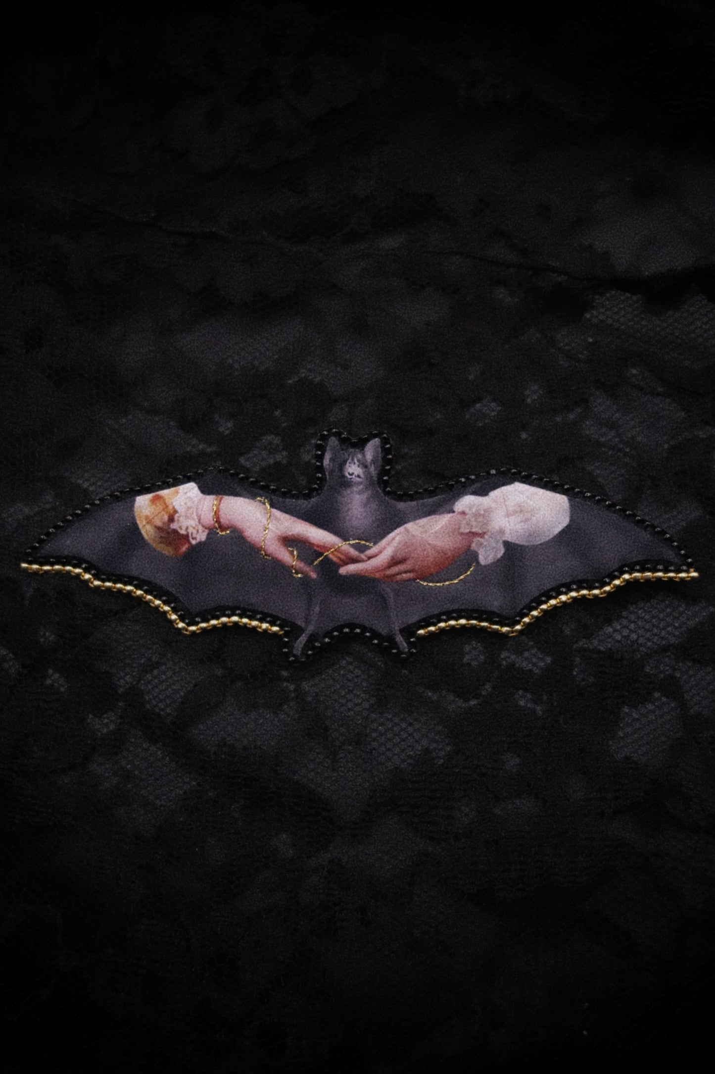 Broche chauve-souris