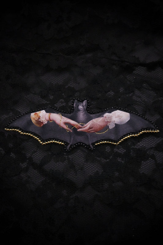 Broche chauve-souris