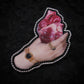 Broche main et cœur barbelé
