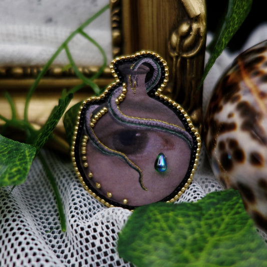 Broche fiole œil et serpent -- vide atelier