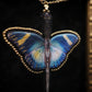 Collier papillon épée