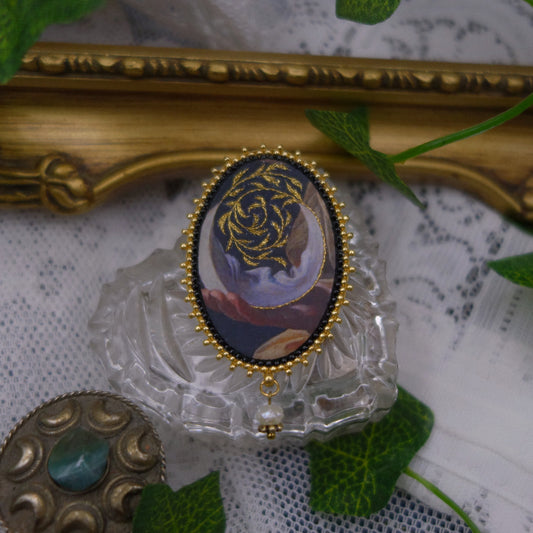Broche lune et feuilles