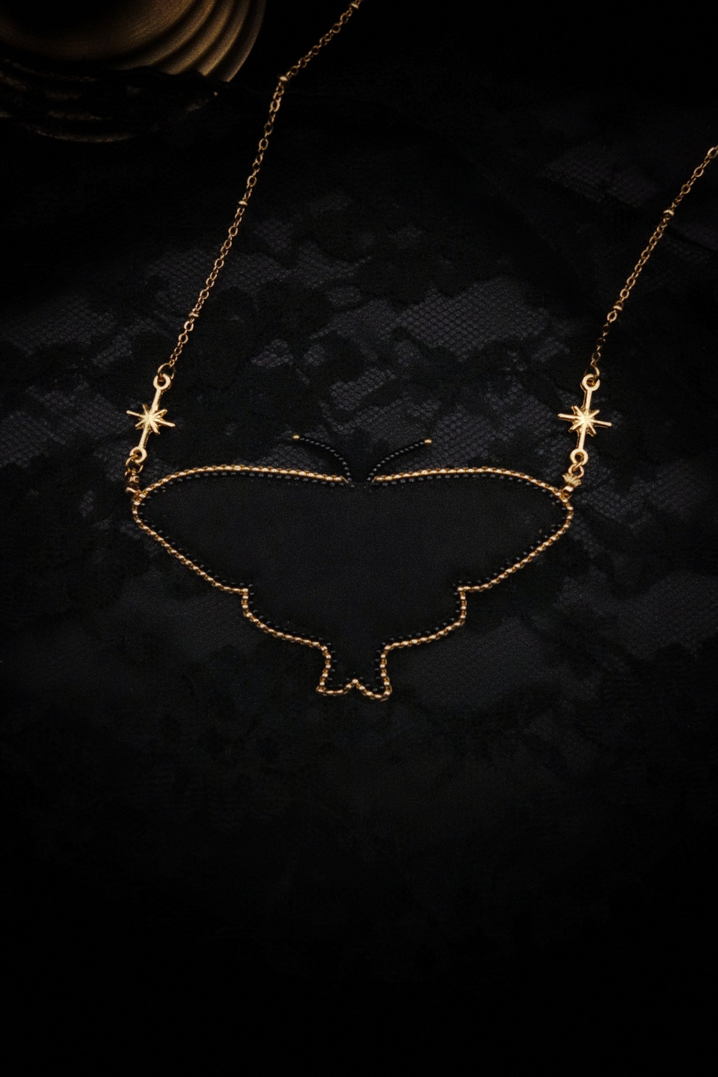 Collier papillon