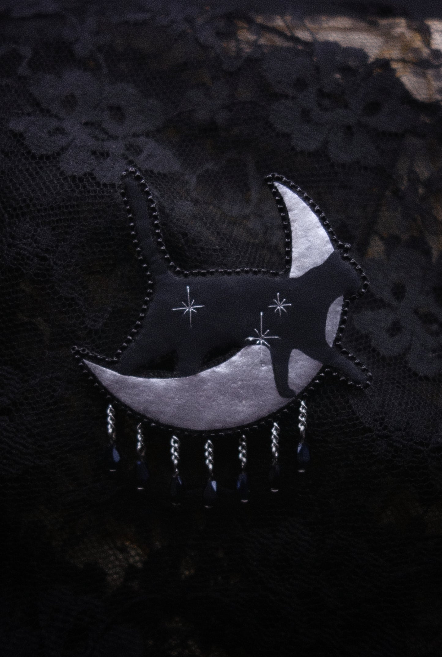 Broche chat noir