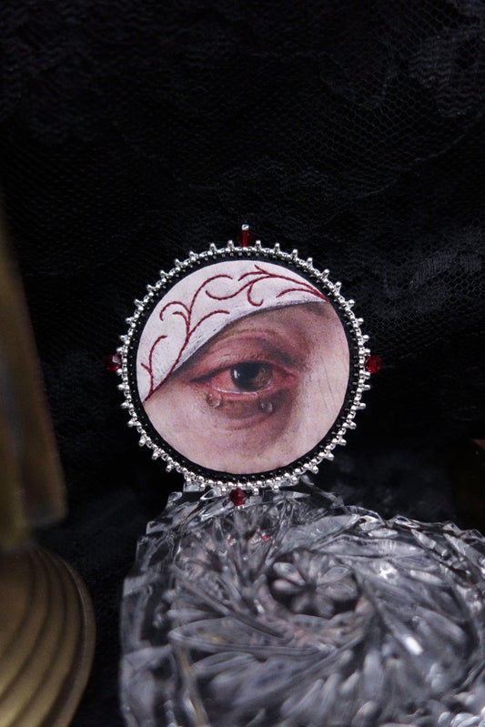 Broche œil