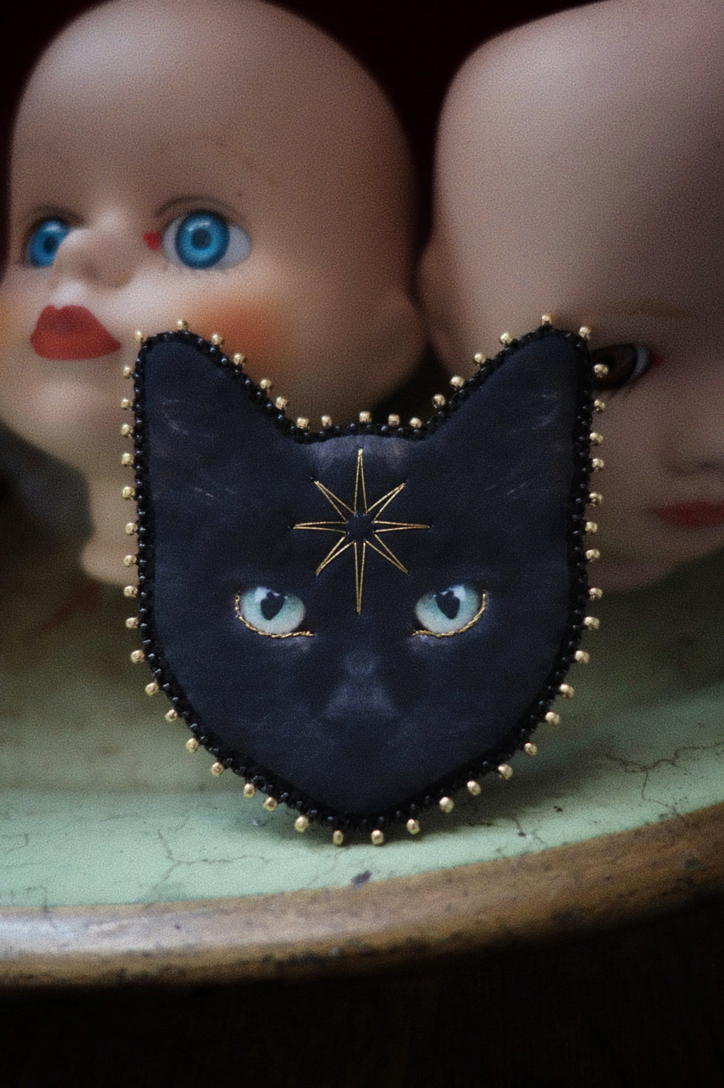 Broche chat