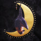 Broche chauve-souris et lune