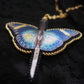 Collier papillon épée
