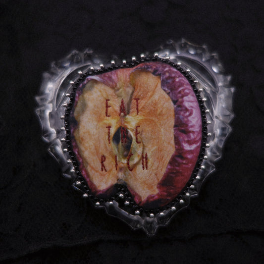 Broche pomme "eat the rich"