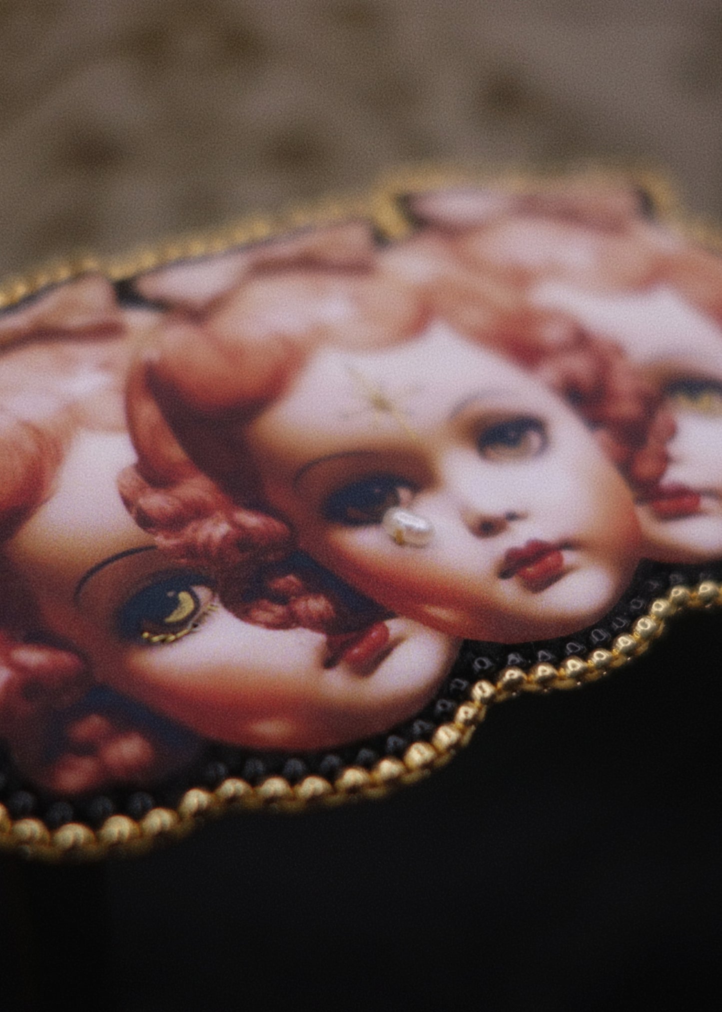 Broche triple tête