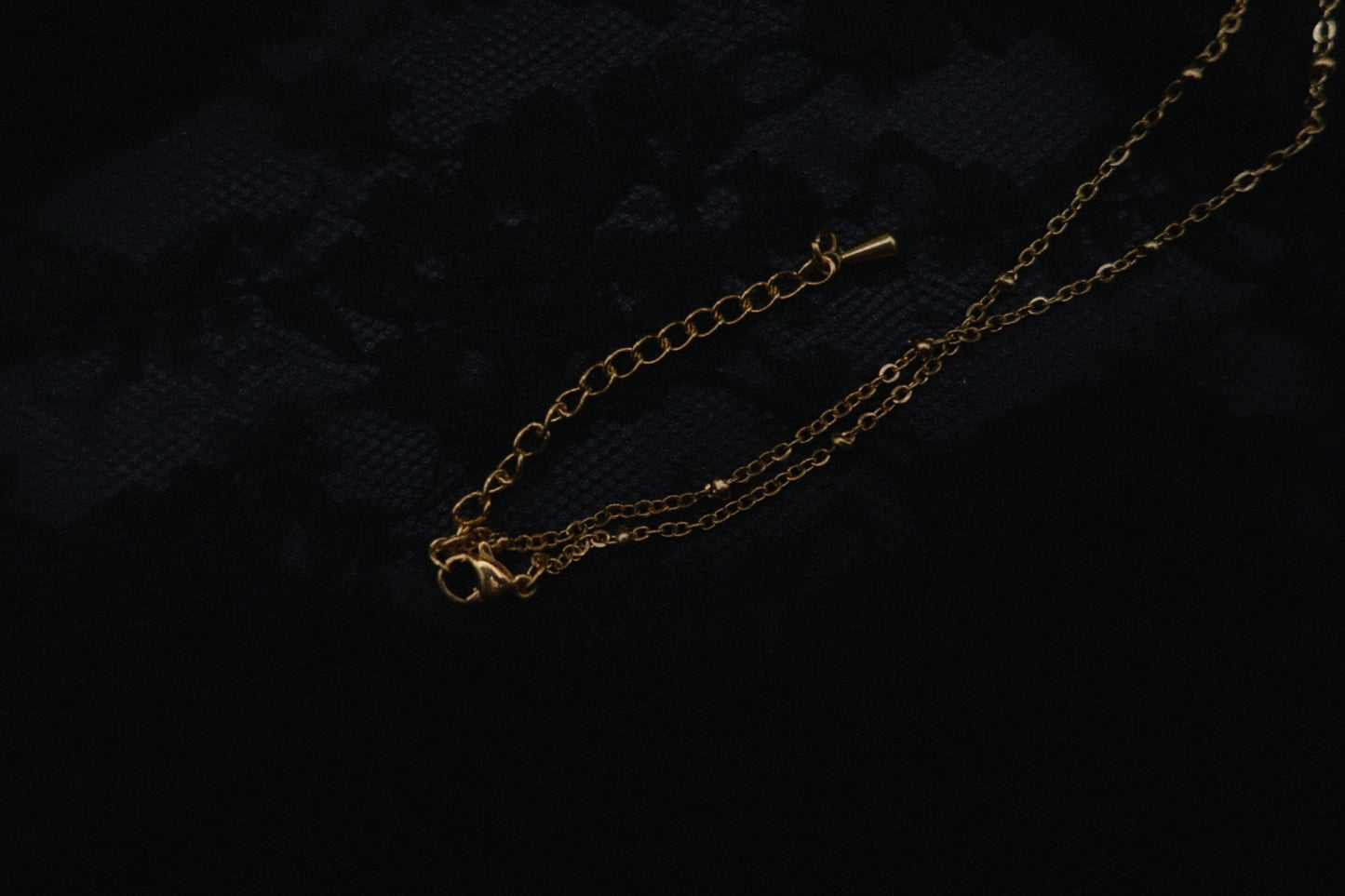 Collier papillon épée