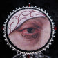 Broche œil