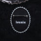 Broche fléau