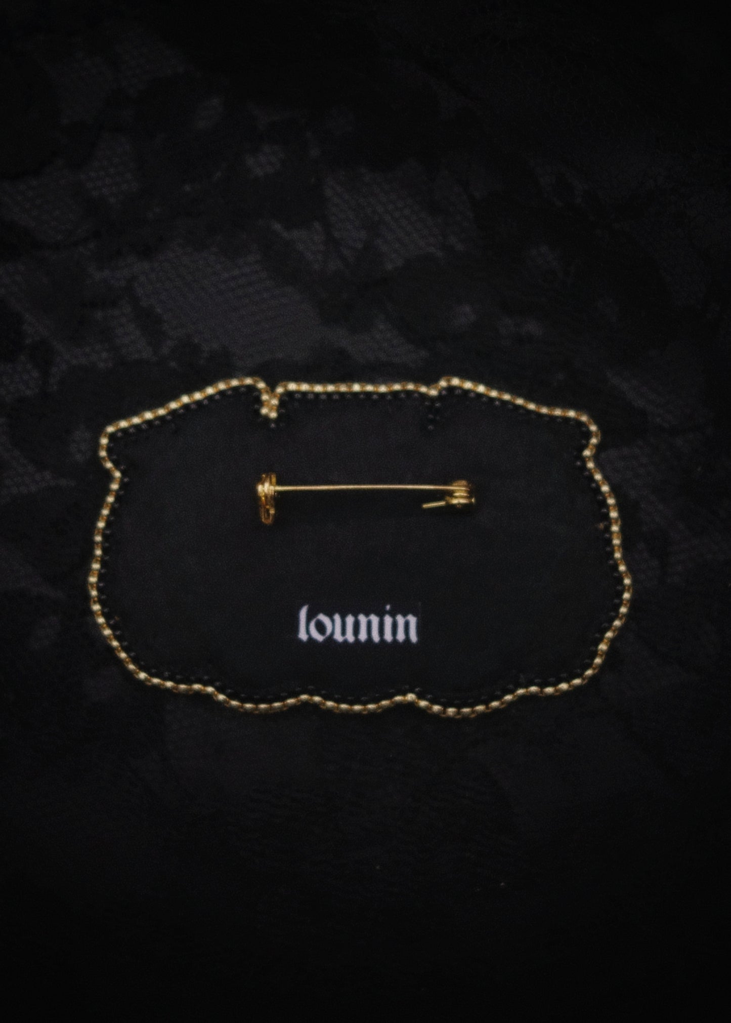 Broche triple tête