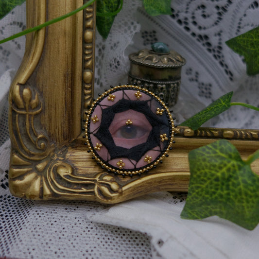 Broche œil