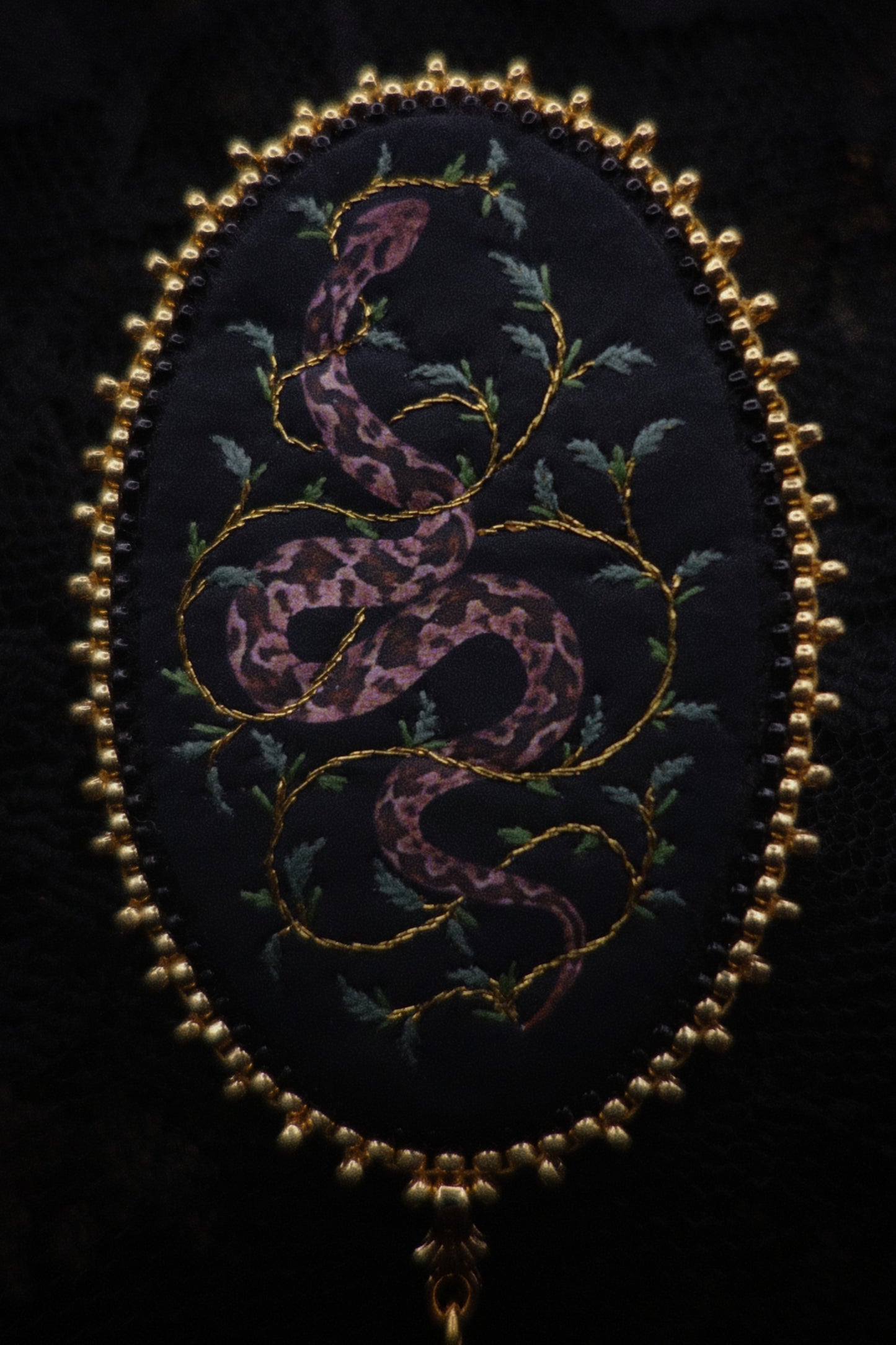 Broche serpent