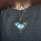 Collier papillon épée