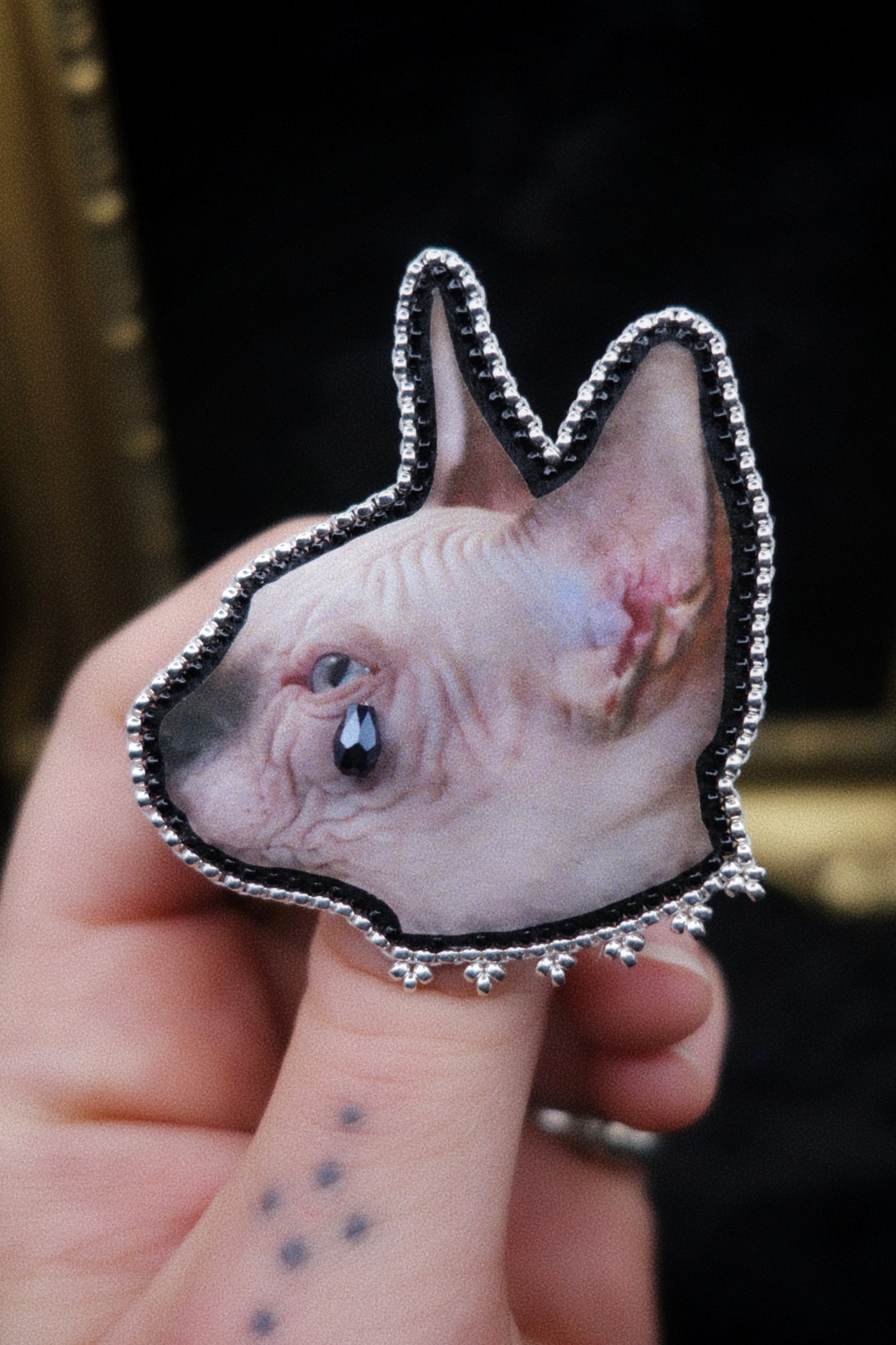 Broche chat