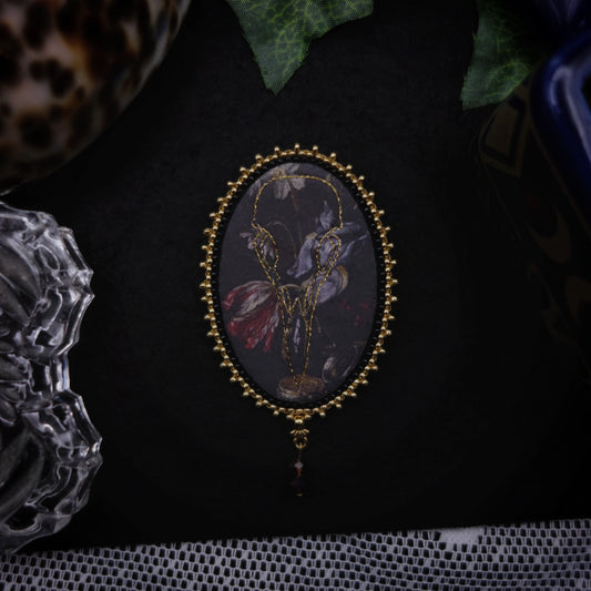 Broche crâne de corbeau