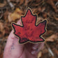 Broche feuille "eat the rich"
