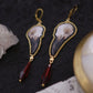 Boucles crâne de corbeau