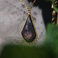 Collier fleur et papillon