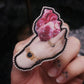 Broche main et cœur barbelé