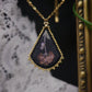 Collier fleur et papillon