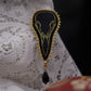 Broche crâne de corbeau