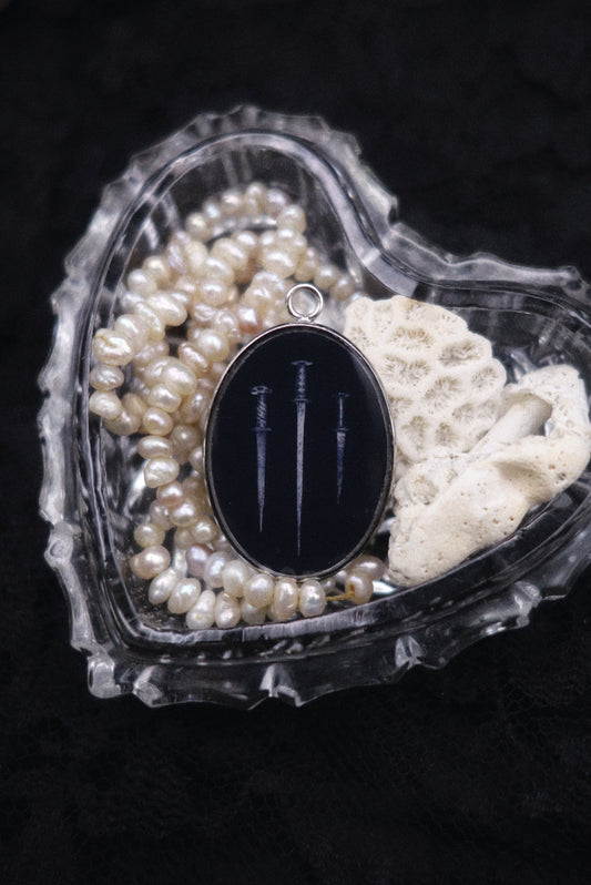 Pendentif épées
